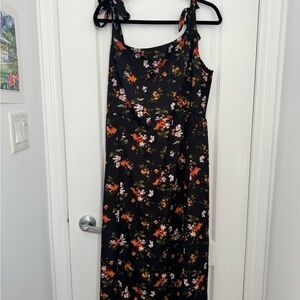 Sleeveless Floral Long Dress with slit.